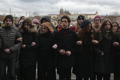 Students march in Prague to honor the victims of the worst mass killing in Czech history